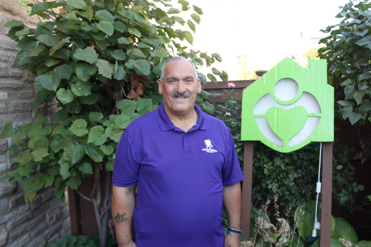 Ed Galarza standing in the Howie's House Legacy Garden.