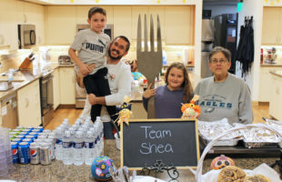 Team Shea posing in front of our kitchen island