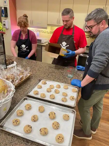 Aramark volunteers baking treats for our guests. 